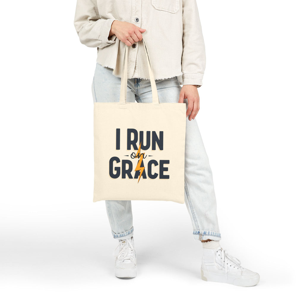 I Run on Grace - Canvas Tote Bag - Strength for the Journey